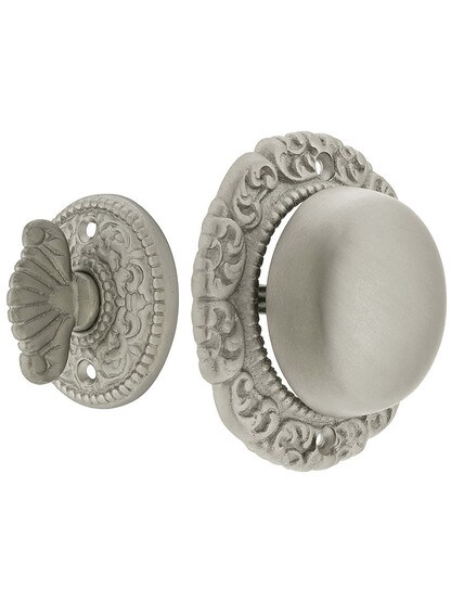 Small Scroll Design Twist Door Bell in Satin Nickel.